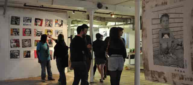 Art exhibition at Kraak Gallery's vibrant venue space with unique decor.