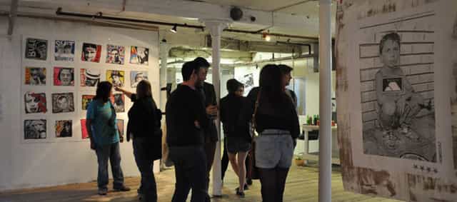 Art exhibition at Kraak Gallery's vibrant venue space with unique decor.