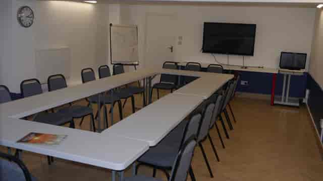 Versatile U-shaped meeting room in metroLAB for workshops and training sessions.