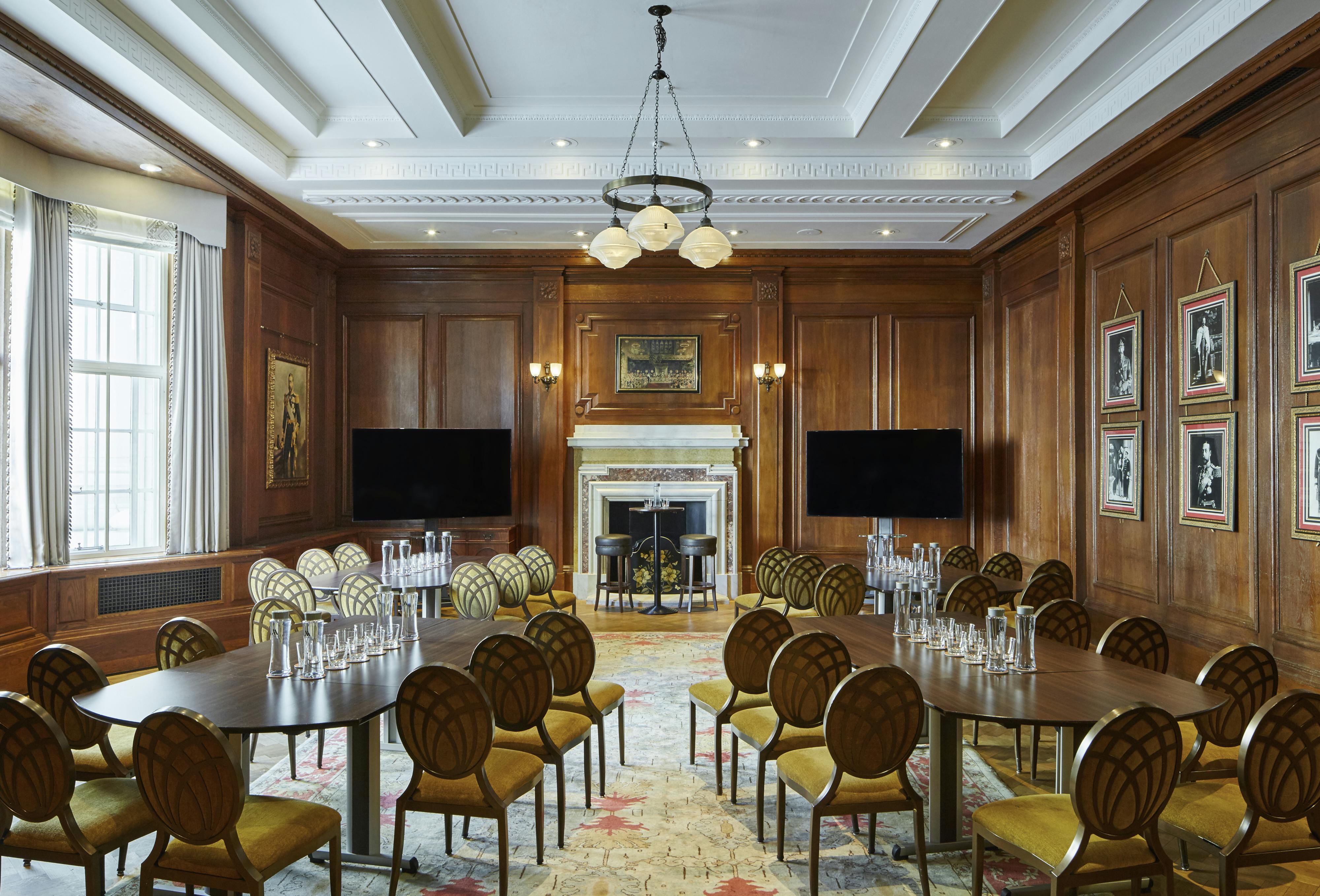 King George & Queen Mary in elegant meeting room, perfect for workshops and strategy sessions.