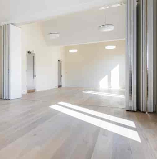 Versatile Meeting Room 2/3 at Toynbee Hall, bright space for events and gatherings.