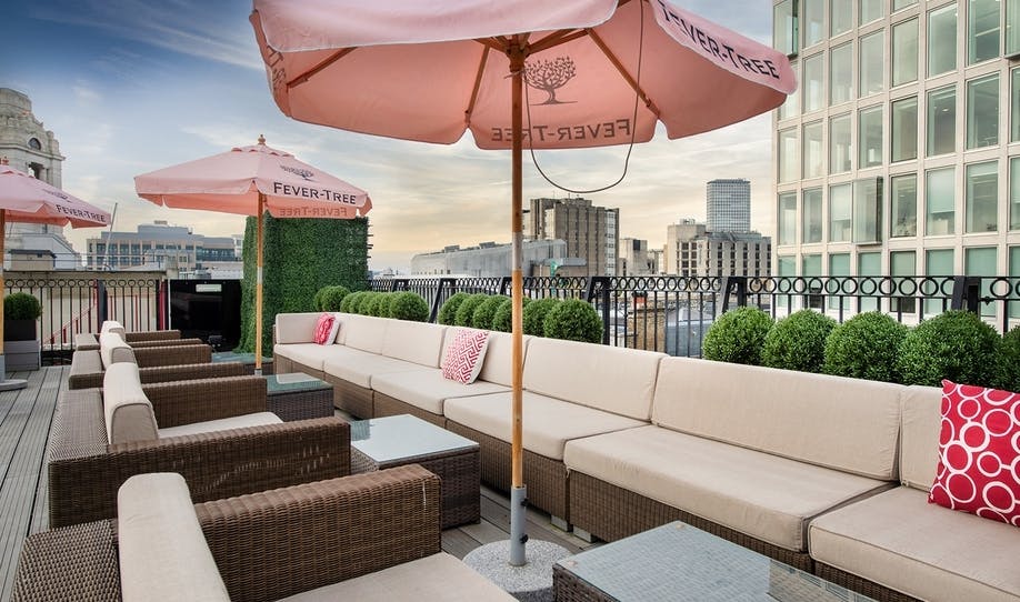 Stylish rooftop lounge at De Vere Grand Connaught Rooms, perfect for networking events.