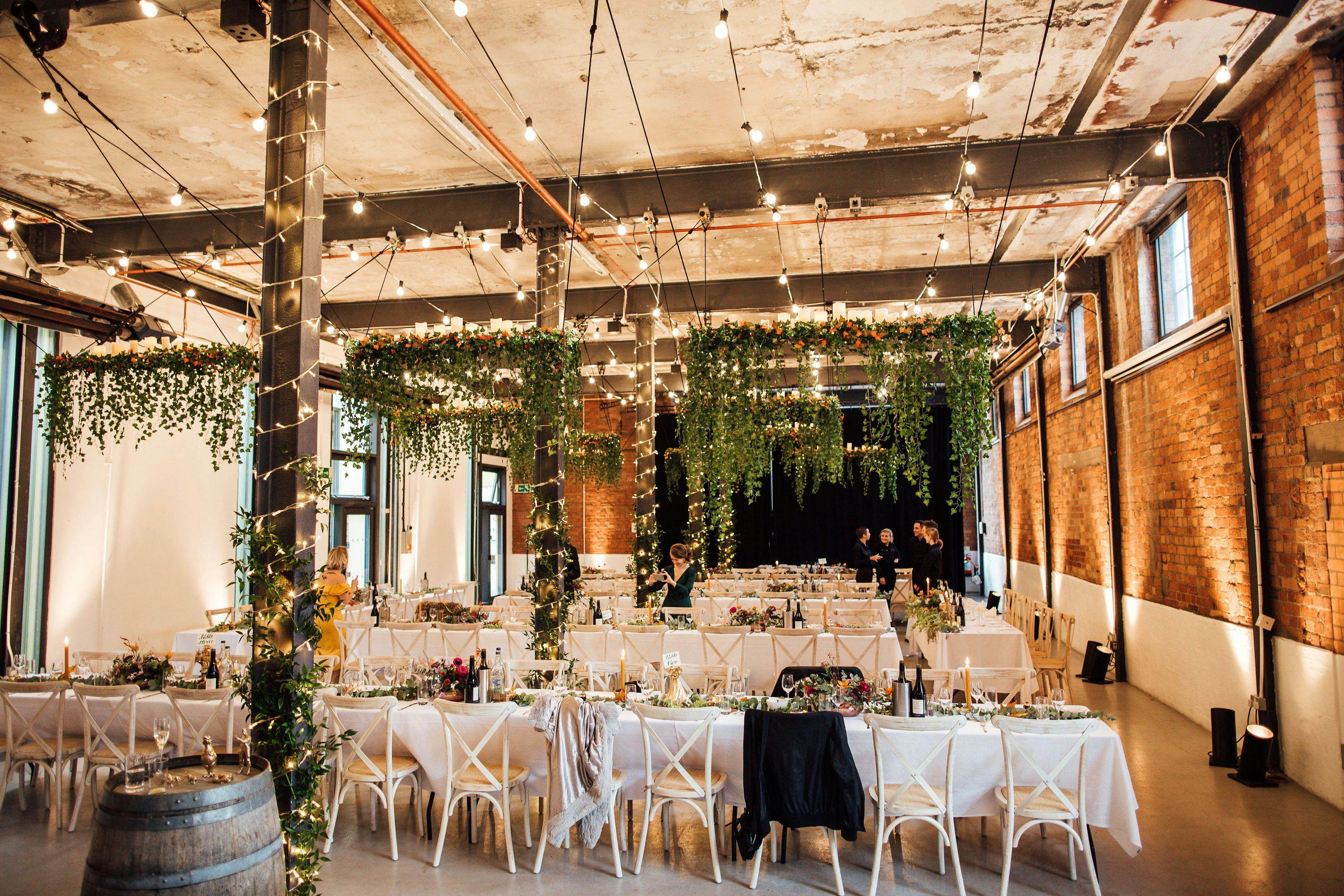 Elegant banquet setup in Paintworks Event Space, perfect for weddings and receptions.
