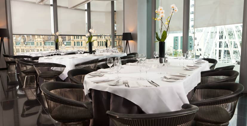 Sophisticated dining setup at The Second Floor Bar & Brasserie for corporate events.