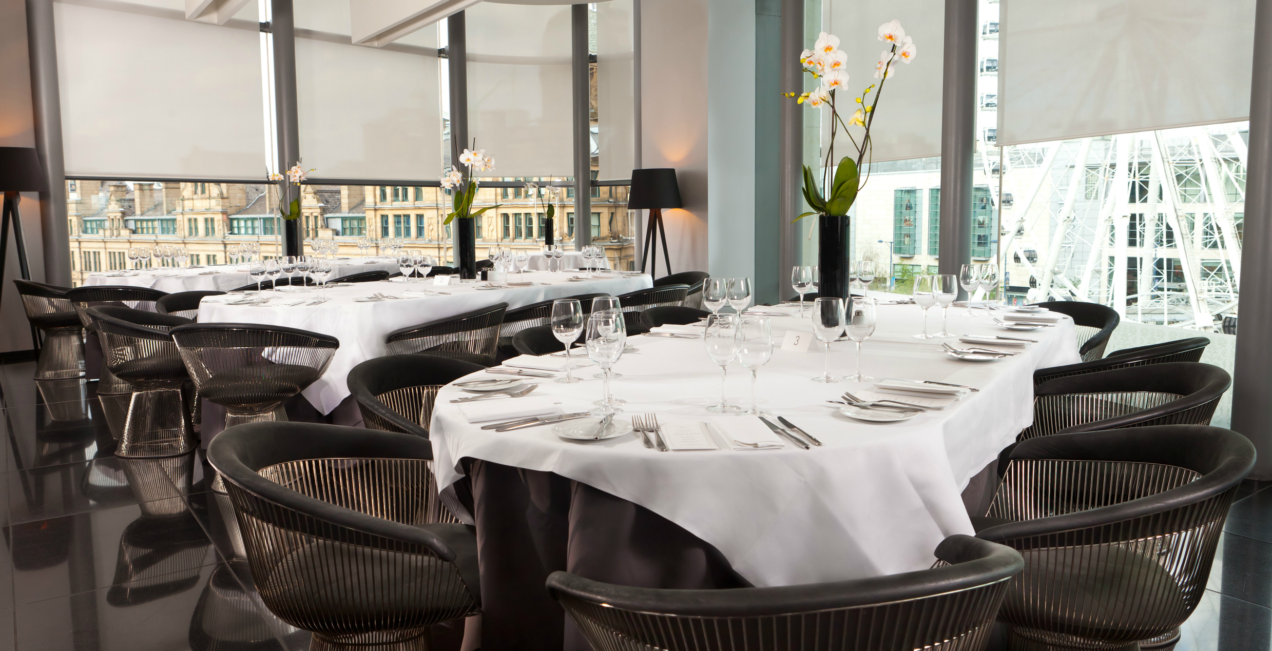 Sophisticated dining setup at The Second Floor Bar & Brasserie for corporate events. - Banner