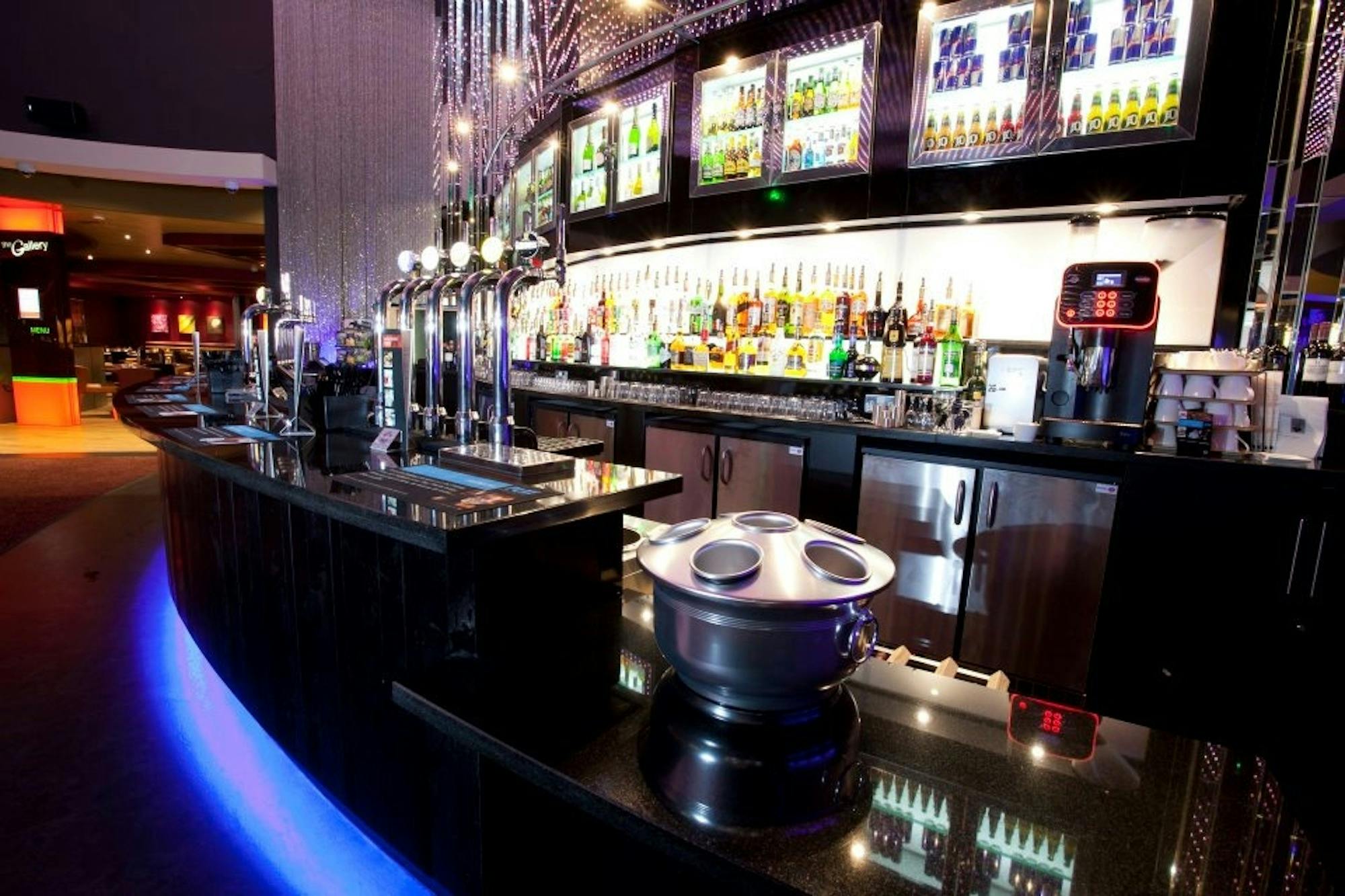 Sleek bar at Grosvenor Casino Didsbury, ideal for events and meetings.