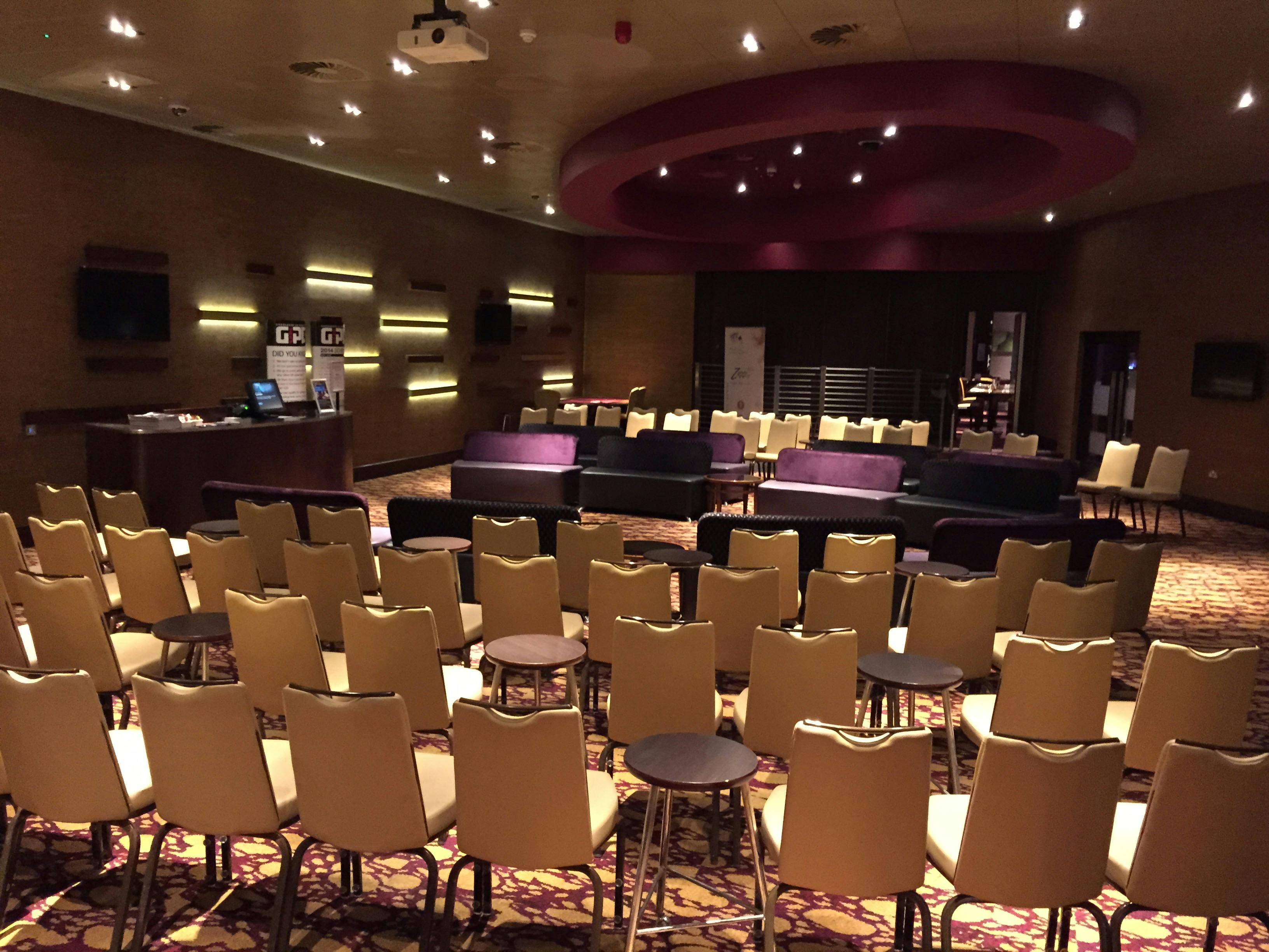 Grosvenor Casino Didsbury poker room, modern decor, versatile meeting space for events.