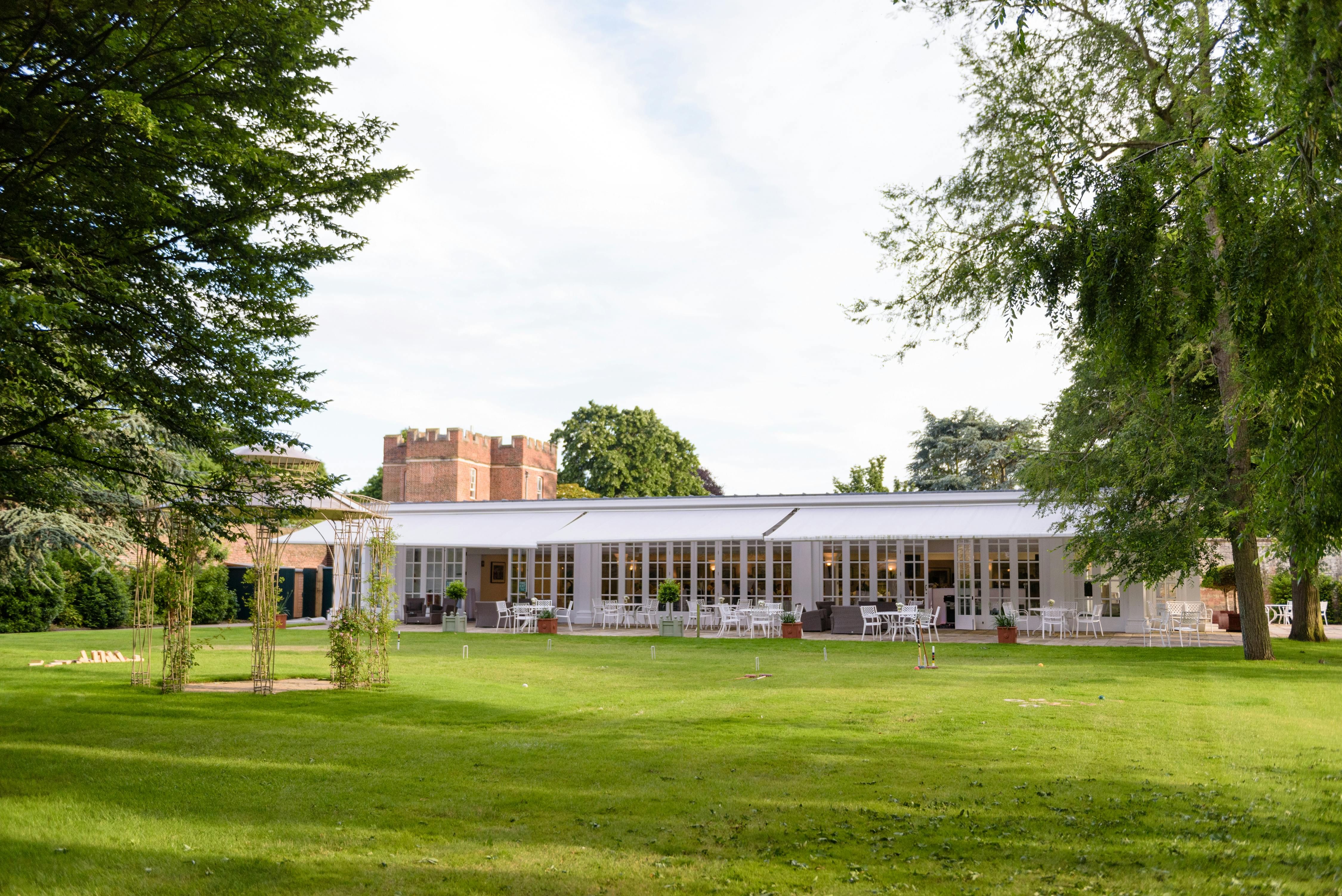 Garden Room at Hampton Court Palace, glass-fronted venue for outdoor events and gatherings.