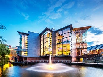 Barbirolli Room at The Bridgewater Hall, modern venue with large glass windows for events.