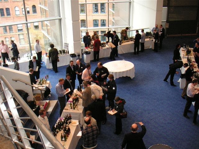 Circle Foyer at The Bridgewater Hall, elegant wine tasting event with networking opportunities.