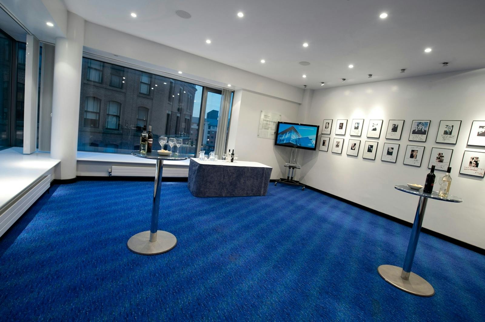 Modern Green Room at Bridgewater Hall with blue carpet, ideal for events and receptions.