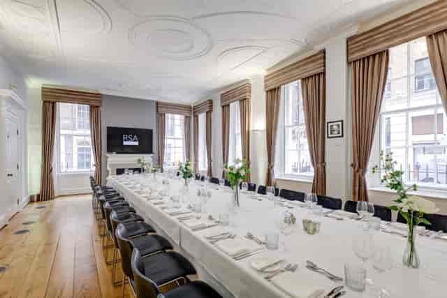 Elegant Tavern Room at RSA House with fine dining setup for meetings and events.