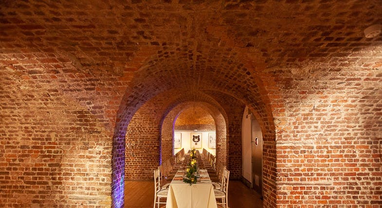 Exposed brick arches in The Vaults, RSA House, perfect for corporate dinners and celebrations.