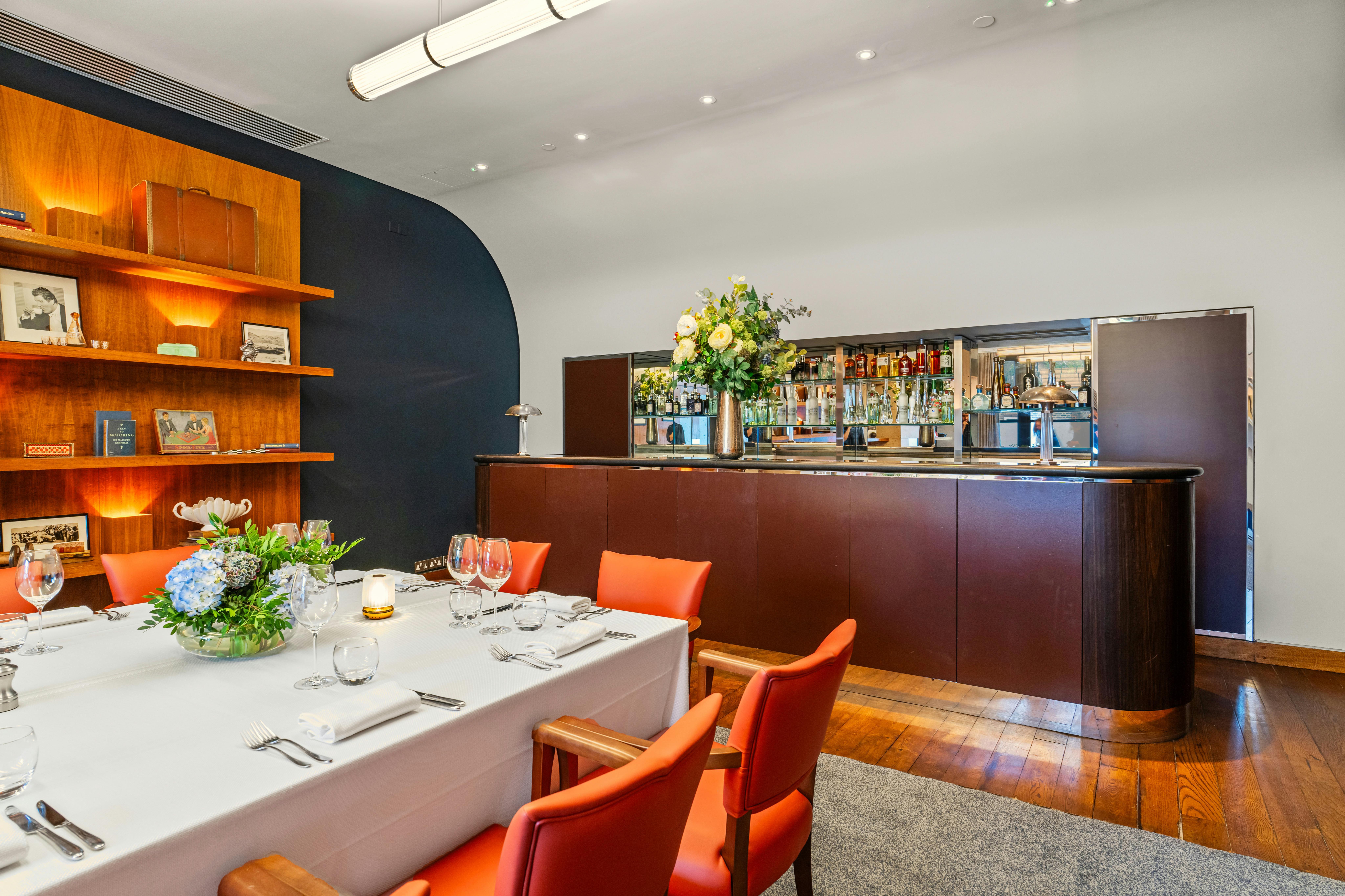 Elegant Bluebird Room with bar, perfect for intimate gatherings and corporate events.