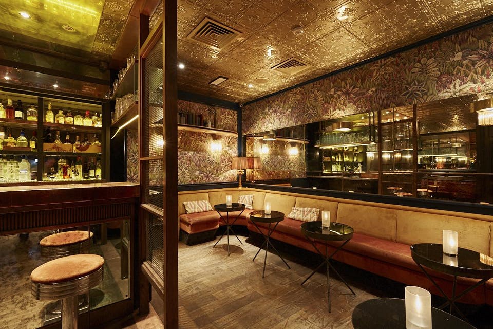 Intimate venue with plush seating for upscale meetings and networking events.