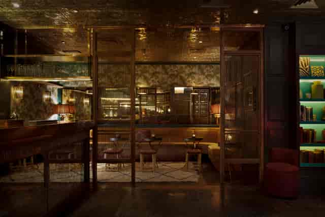 Sophisticated venue with warm lighting for upscale events and intimate gatherings.