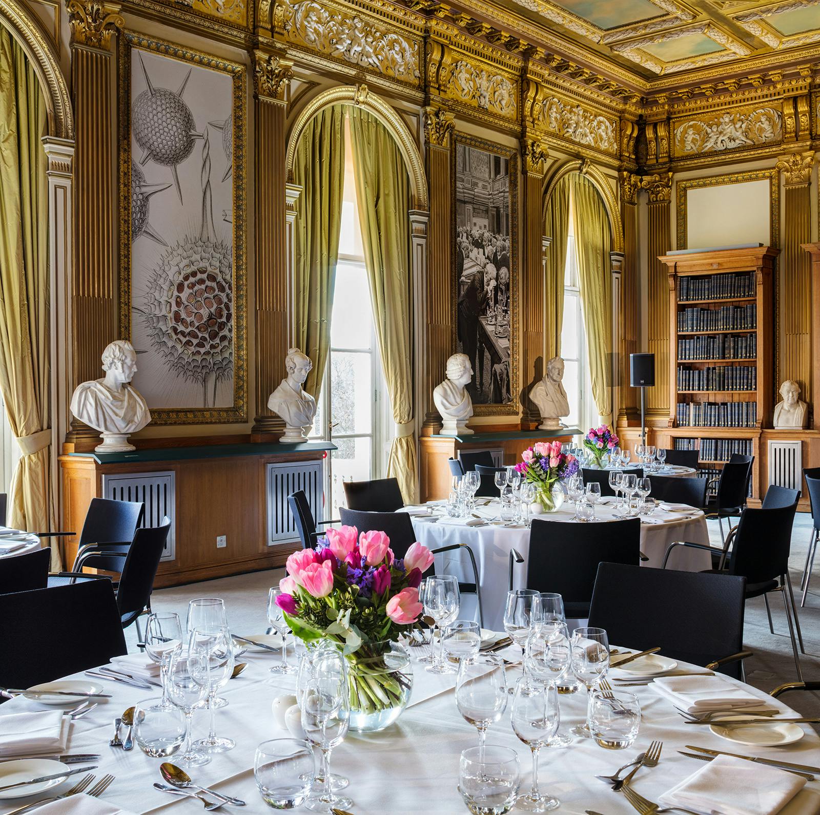 Elegant dining setup in Royal Society's Wolfson Rooms for corporate events and formal dinners.