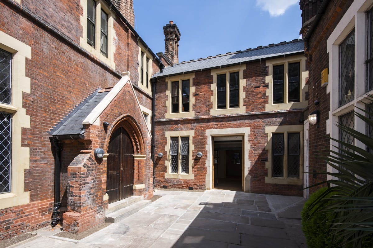 Charming courtyard at Toynbee Hall, ideal for outdoor networking events and breakout sessions.