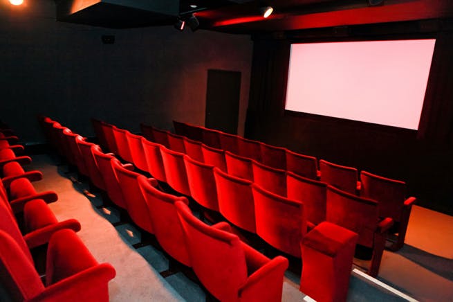 Cinema 2 at ICA: plush red seating, ideal for film screenings and presentations.