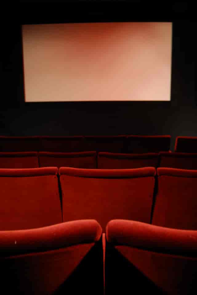 Red plush theater seats in Cinema 2 at ICA, perfect for film screenings and presentations.