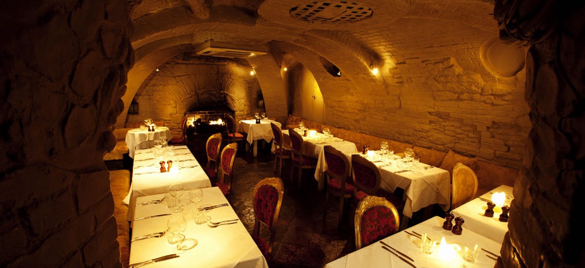 Intimate dining space in The Crypt, Beach Blanket Babylon, perfect for private events.