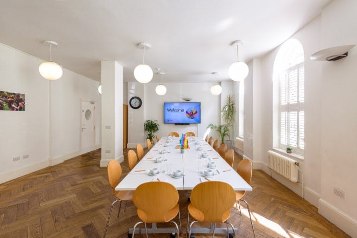 Modern meeting room in Fitzrovia Community Centre, ideal for presentations and events.