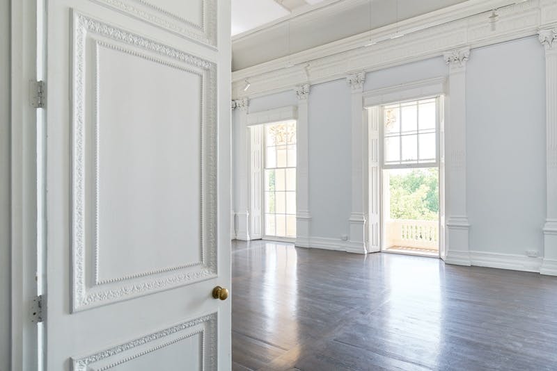 Elegant meeting room with large windows at Institute of Contemporary Arts for events.