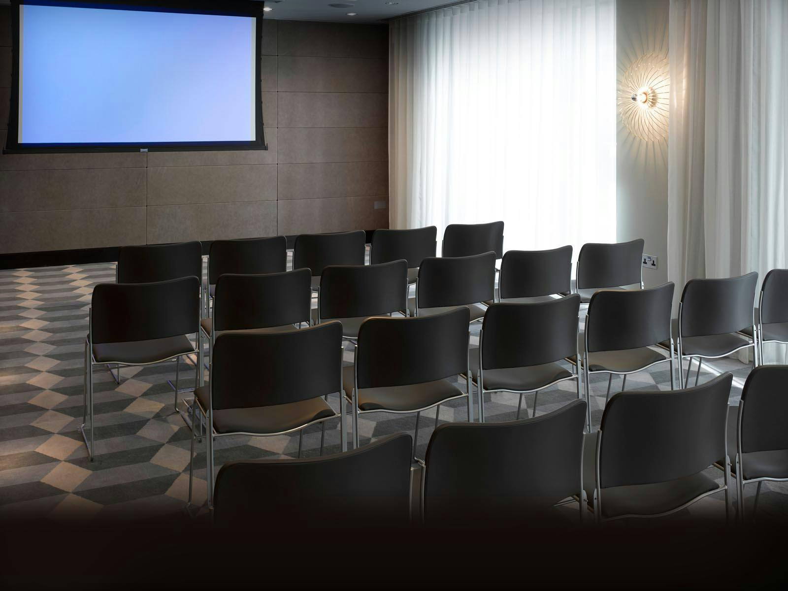 Sleek meeting space at South Place Hotel, perfect for presentations and workshops.