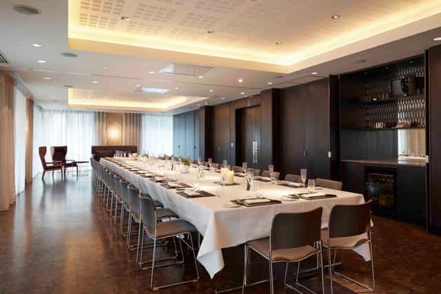 Purdey and Steed in a sleek meeting room, perfect for corporate events and presentations.