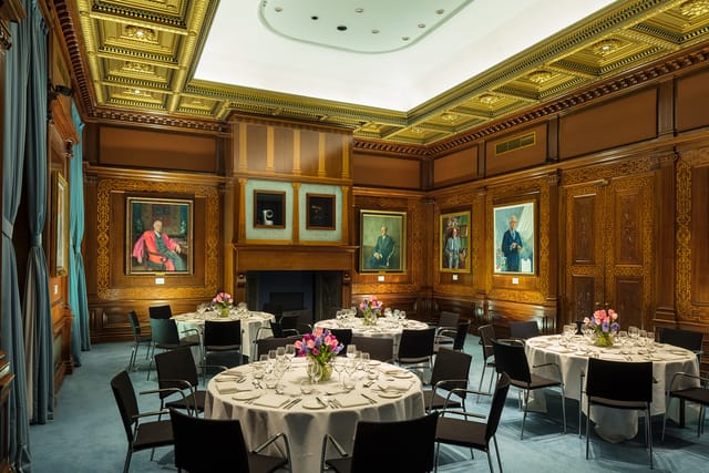 Elegant Kohn Centre with round tables and floral centerpieces for events and gatherings.