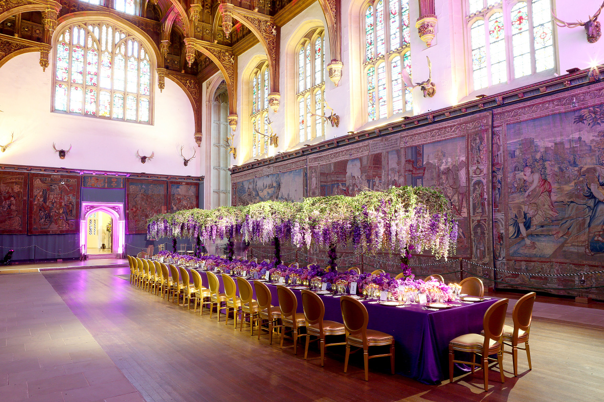 Elegant State Apartments at Hampton Court Palace with purple decor for upscale events. - Banner