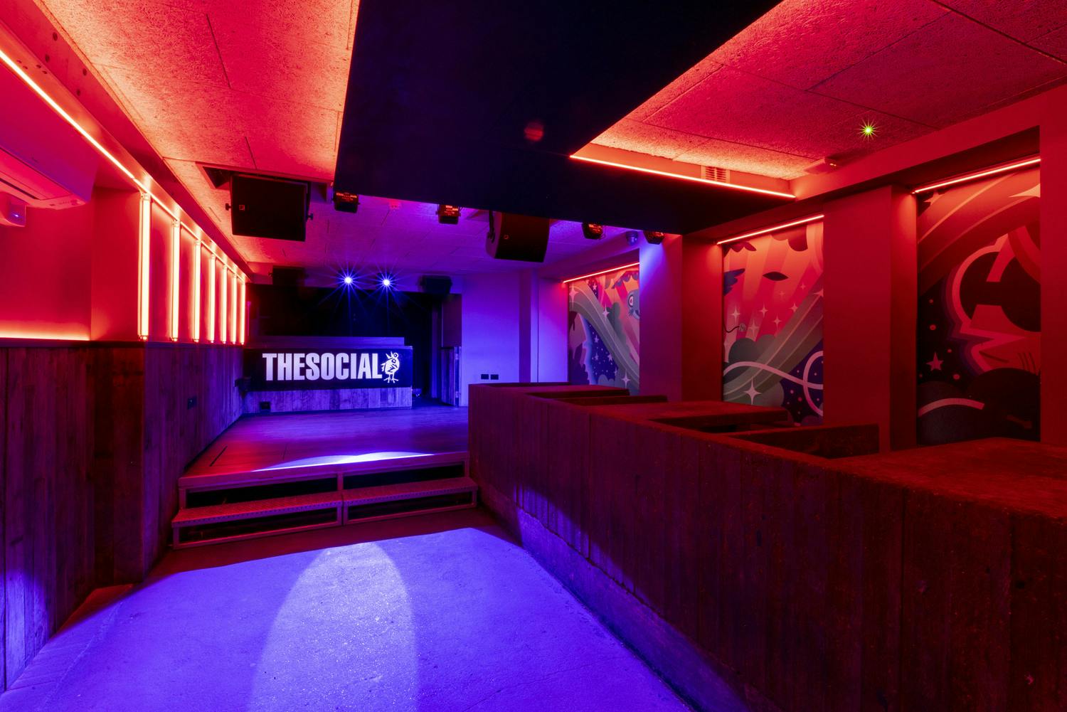 Vibrant event space with bold lighting for corporate and social gatherings at The Social.