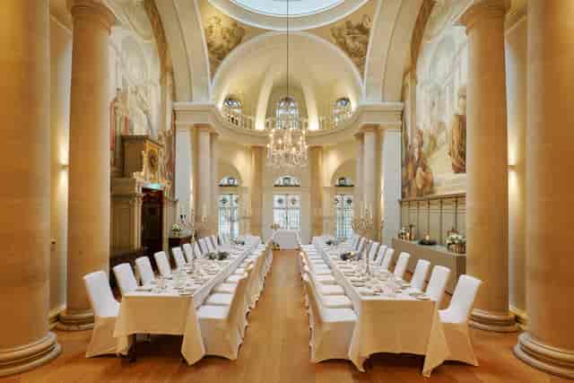 Elegant Main Reception Room with grand ceiling, ideal for corporate events and formal dinners.