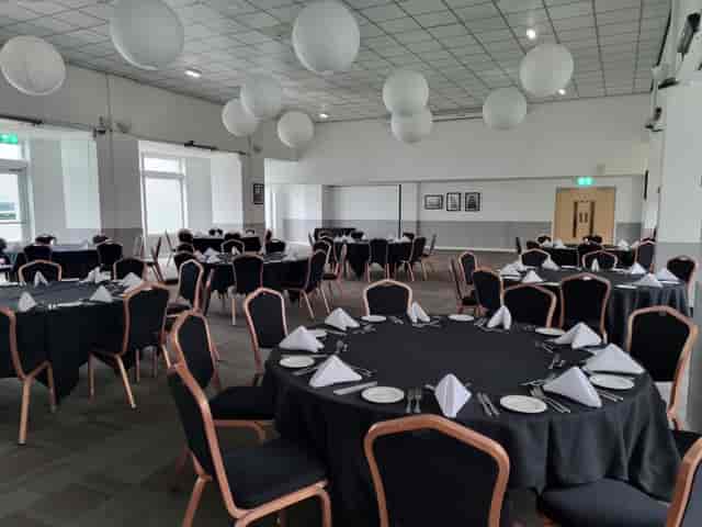 Pioneer Room at Manchester Conference Centre, elegant event space with round tables.