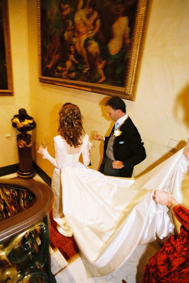 Couple at wedding in elegant Courtyard of The Wallace Collection, showcasing sophisticated ambiance.