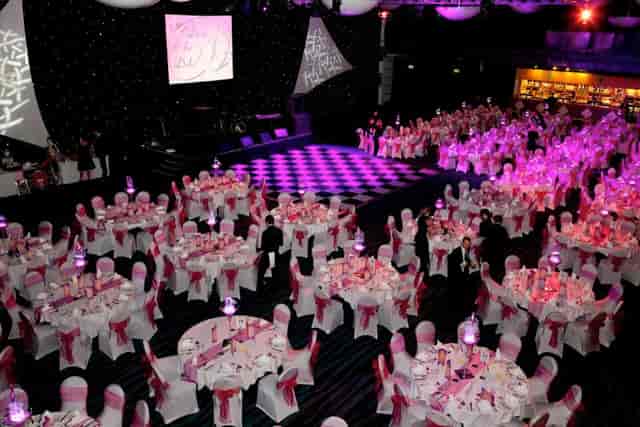 Premier Suite at Bolton Whites Hotel, elegant gala setup with pink sashes, corporate events.