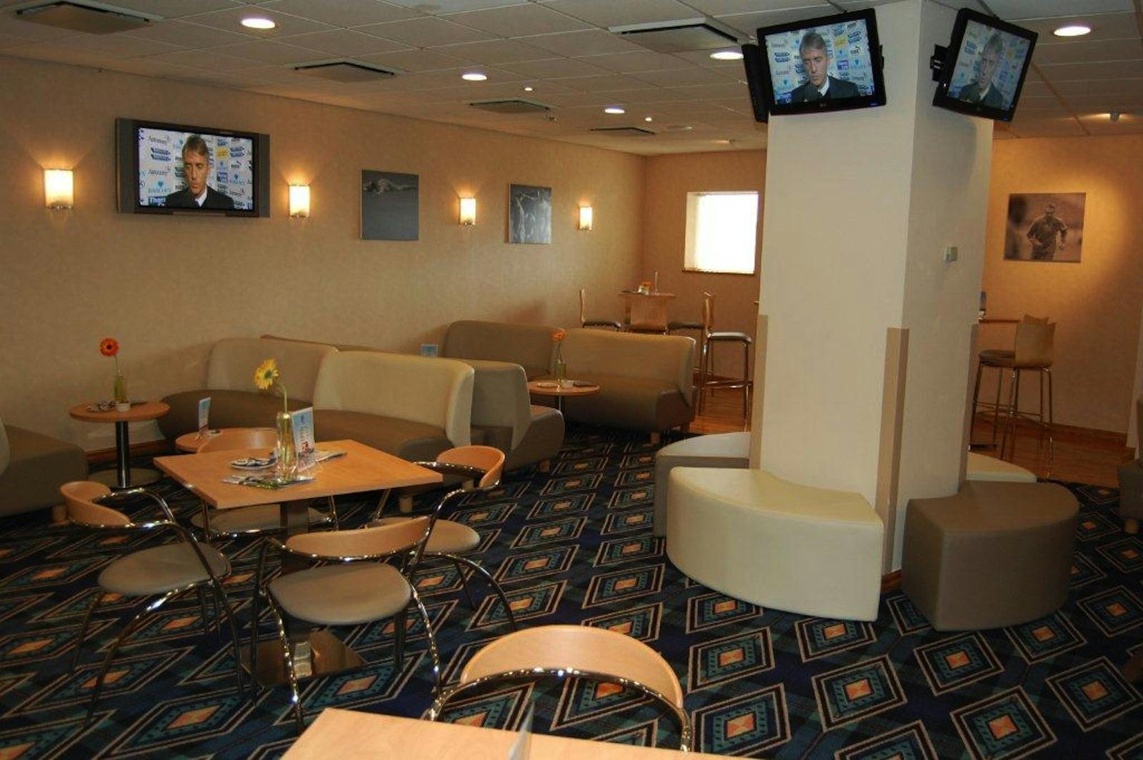 Modern lounge in Wanderers Suite, Bolton Whites Hotel for networking and meetings.