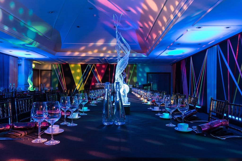 Elegant long table set for a formal dinner at The James Watt, ideal for corporate events.