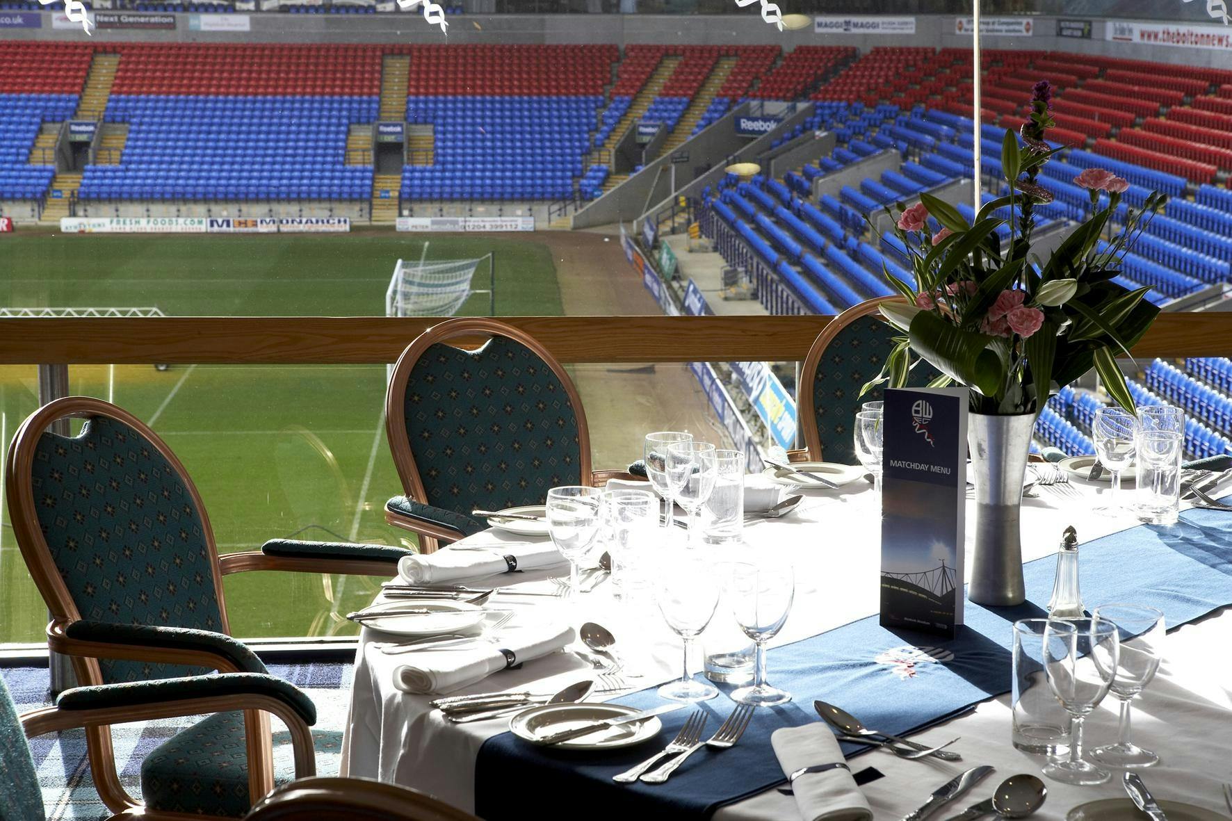 Executive Box at Bolton Whites Hotel with elegant dining setup for corporate events.