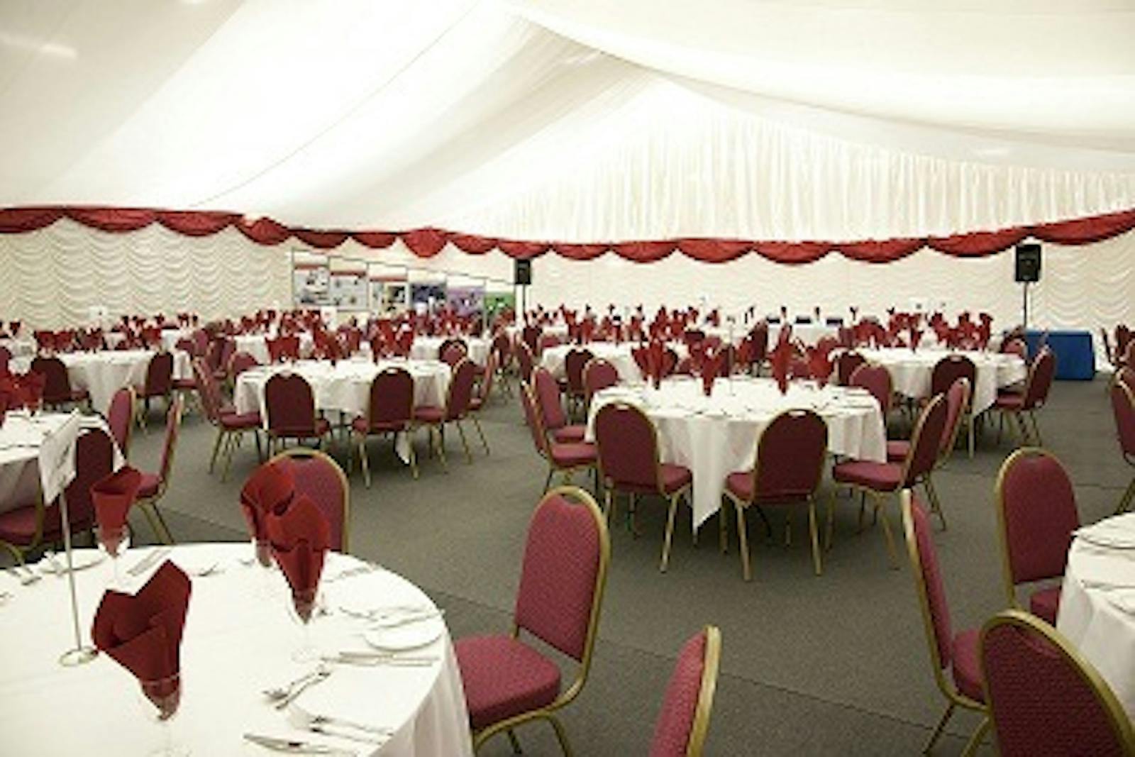 Indoor Marquee at Castlefield Hotel with elegant tables for corporate events and formal dinners.
