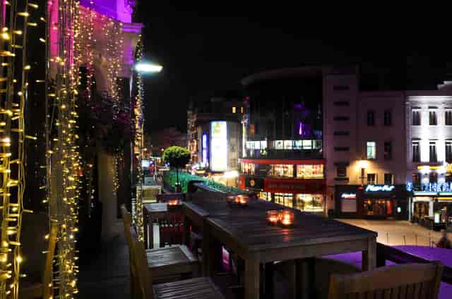 Vibrant outdoor venue at Ruby Blue, perfect for evening networking events and gatherings.