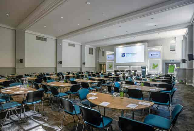 Woburn Hall meeting space in cabaret layout for corporate events and professional conferences.