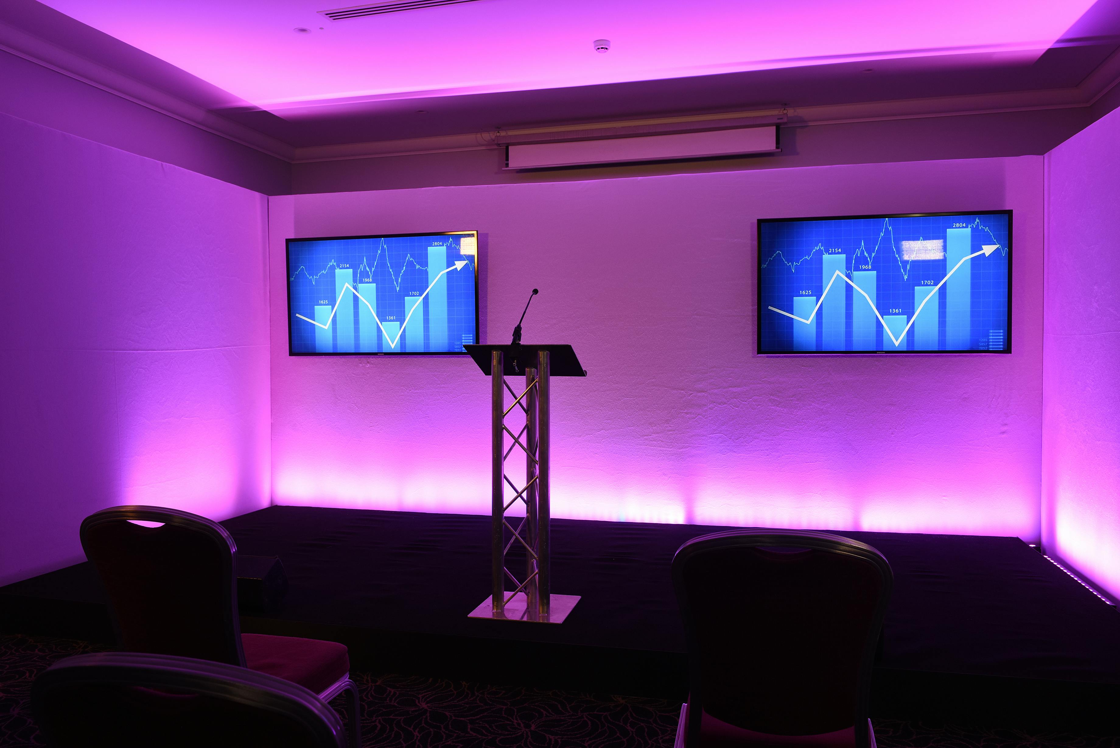 St James Suite at The Cavendish London, sleek setup for corporate presentations.