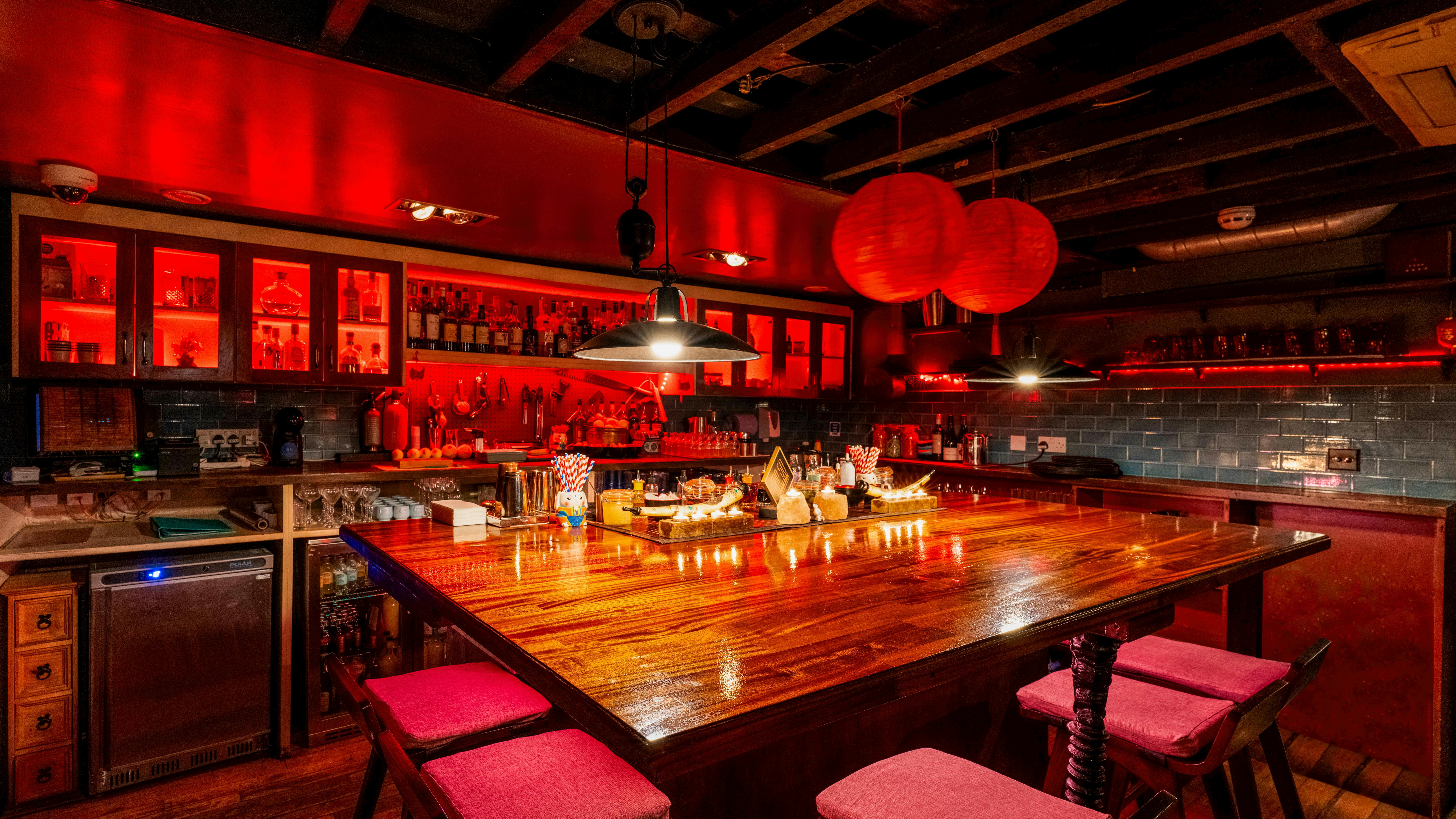 Vibrant bar at The Academy, ideal for networking events and cocktail receptions.