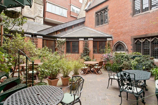 Charming outdoor courtyard at St Matthew's Conference Centre for networking events.