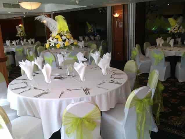 Empire Conference Hall wedding banquet setup with lime green decor for formal gala reception.