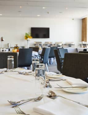 Meeting Rooms at The Lowry Hotel, modern decor, ideal for corporate events and dining.