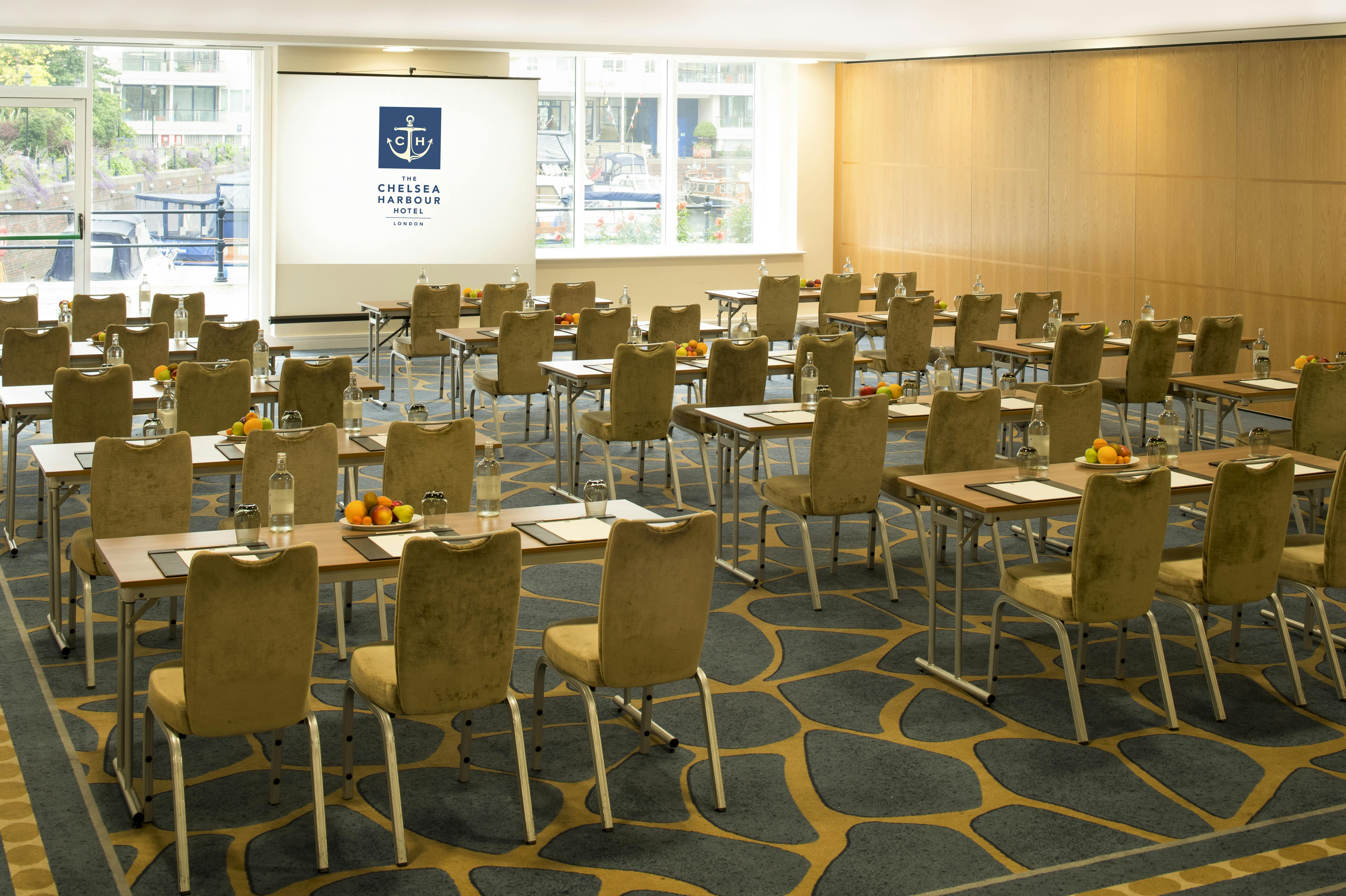 Grand Room 1 at Chelsea Harbour Hotel, set for a corporate event with tables and chairs.