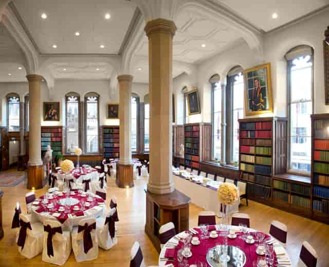 Elegant event space at Christie's Bistro with round tables for upscale receptions.