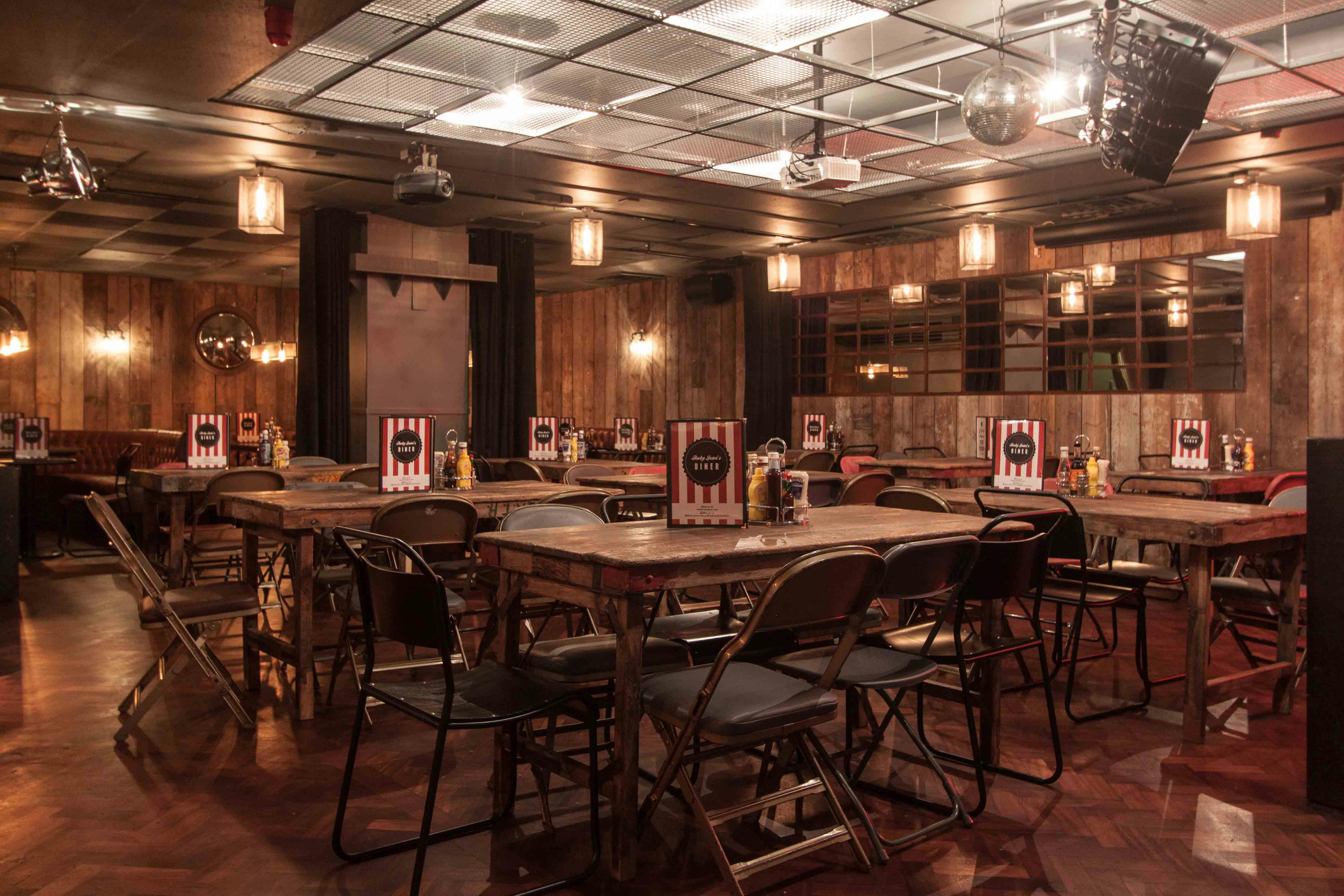 Intimate event space with rustic decor, perfect for networking and workshops.